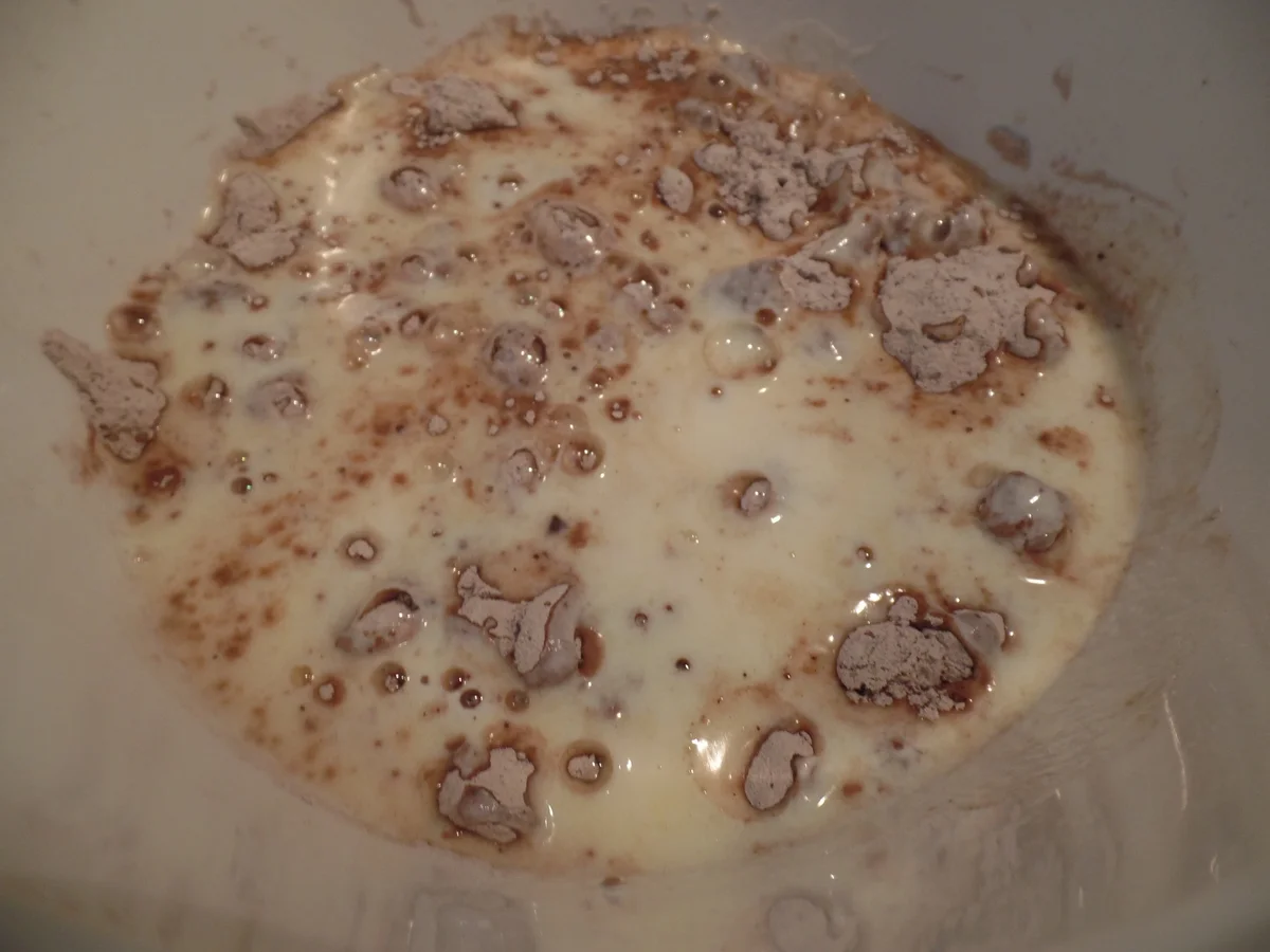 Bananen -Schokoladen-Muffins mit Kakao-Puderzucker-Glasur und Haselnüssen - Rezept - Bild Nr. 11268