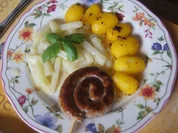 Fränkische Bratwurstschnecke mit Rahmkohlrabi und Drillingen - Rezept - Bild Nr. 3