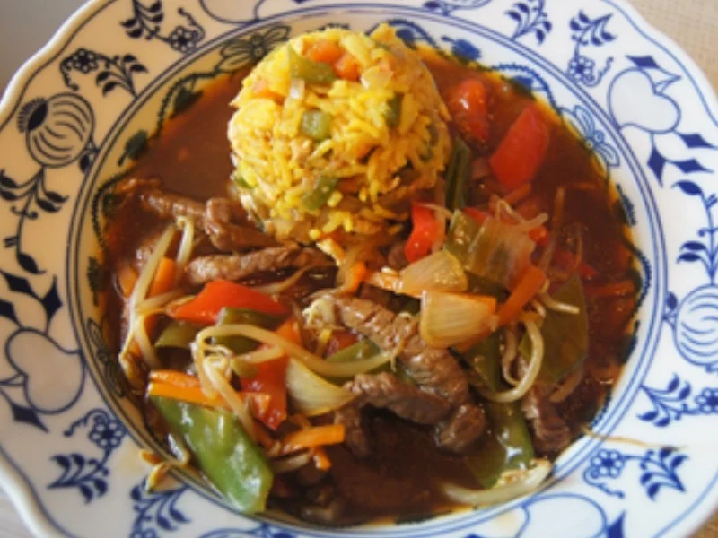 Rindfleisch mit Gemüse und Bratreis - Rezept - Bild Nr. 2