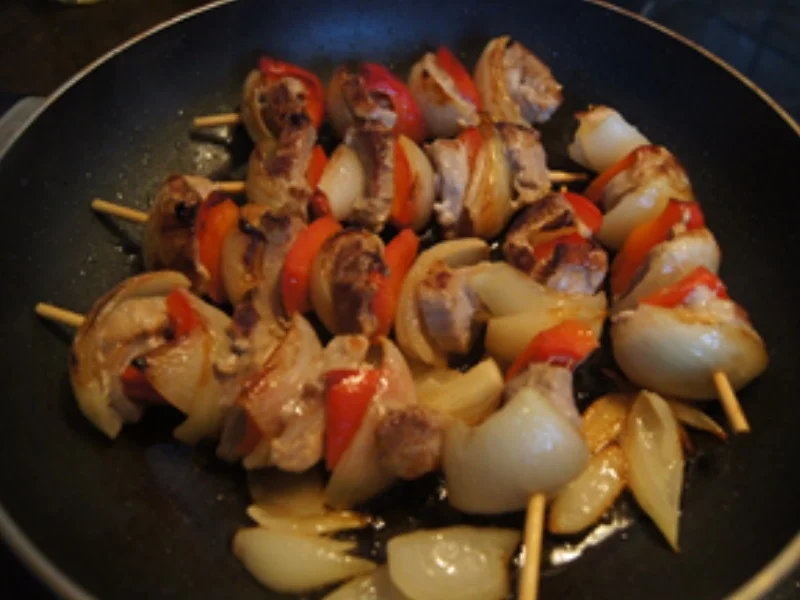 Rezept: Schweinefiletspieße mit Paprika-Erbsen-Rosinen-Bratreis Bild Nr. 12 Schweinefiletspieße mit Paprika-Erbsen-Rosinen-Bratreis - Rezept - Bild Nr. 12