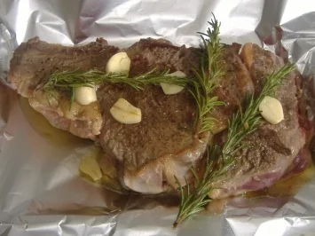 Chuleton a la brasa ( Rinderkotelett mit  Zwiebeln ) - Rezept