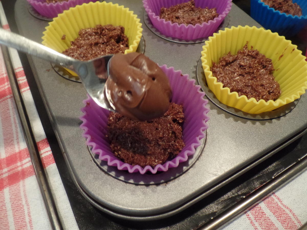 Schoko-Kokos-Muffins mit Nutella-Kern - Rezept - kochbar.de