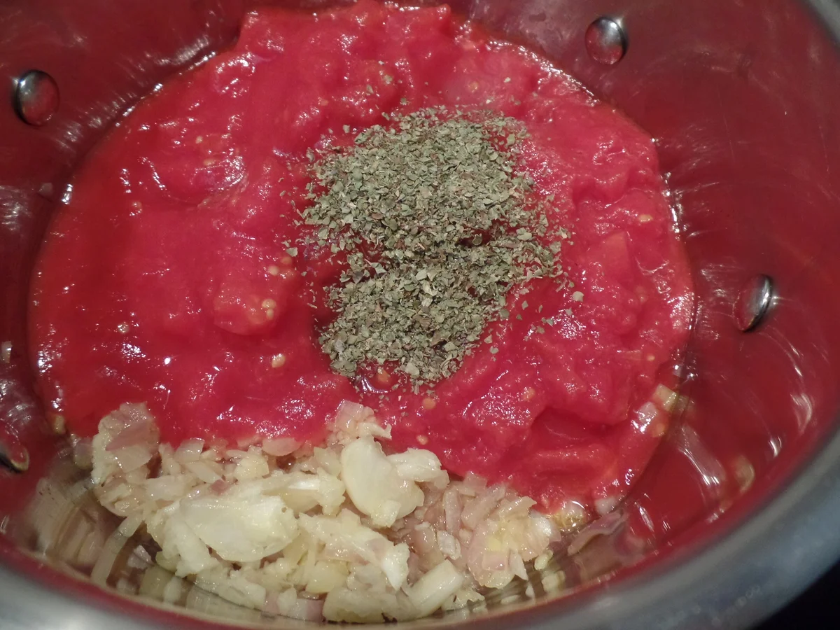 Edelpizza mit Rucola -Tomatensalat und Parmaschinken - Rezept - Bild Nr. 12794