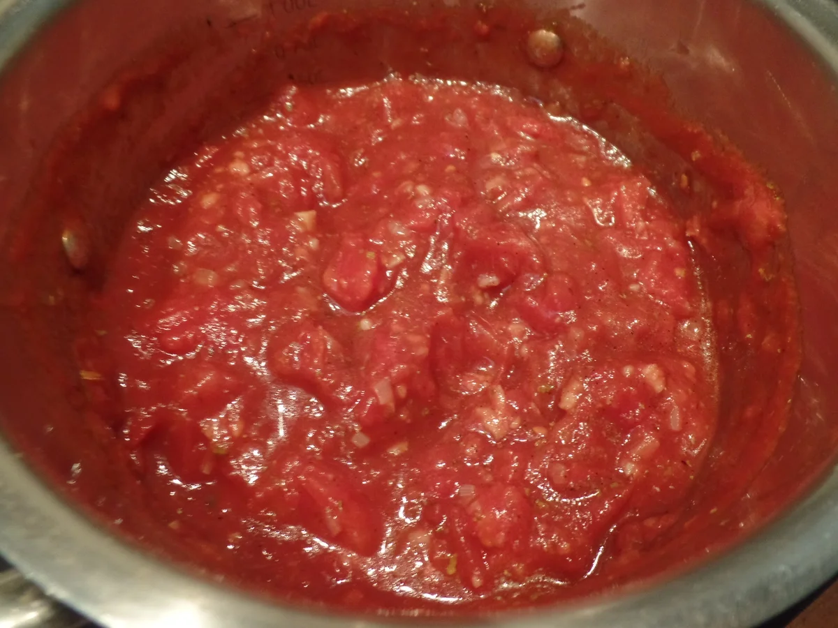 Edelpizza mit Rucola -Tomatensalat und Parmaschinken - Rezept - Bild Nr. 12796