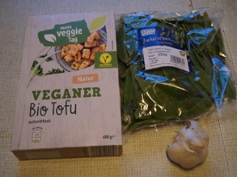 Gebratene Tofu-Würfel mit Zuckerschoten und Knoblauch im Wok - Rezept - Bild Nr. 3