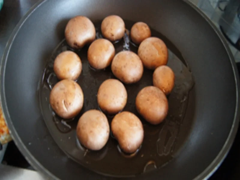 Hähnchenschenkel mit Champignons, Spinat und Curryreis - Rezept - Bild Nr. 7