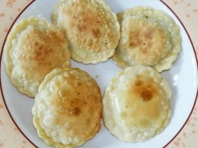 Ravioli mit Hühnerfleisch- und Gemüsefüllung – Ravoli di pollo - Rezept - Bild Nr. 11