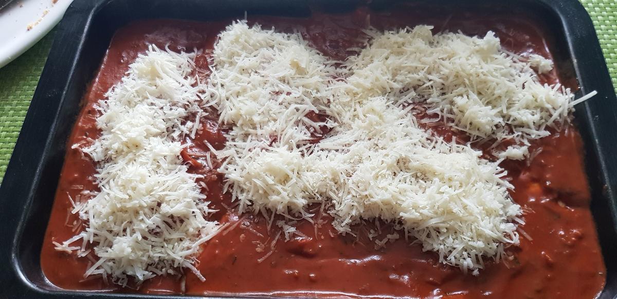 Parmesan-Hühnerschenkel in Tomaten-Rahmsoße - Rezept - Bild Nr. 13944