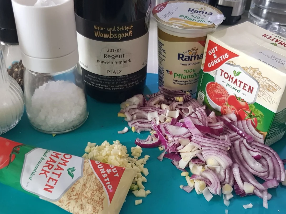 Parmesan-Hühnerschenkel in Tomaten-Rahmsoße - Rezept - Bild Nr. 13949