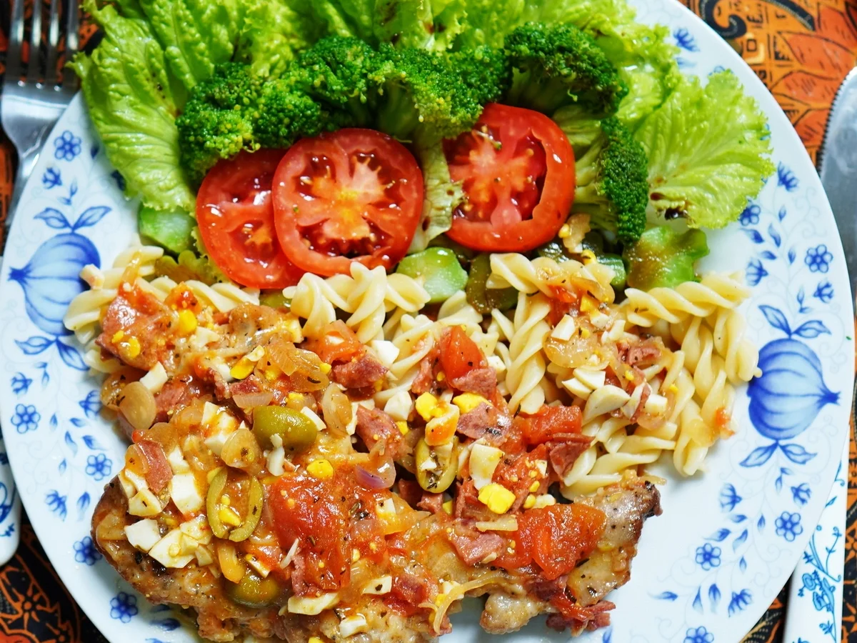 Schweinskoteletts mit Oliven - Braciole di maiale alle olive - Rezept - Bild Nr. 14134