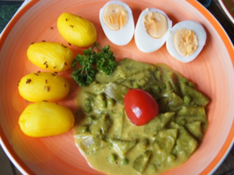 Gekochte Eier mit Currysauce, Zuckerschoten, Erbsen und Drillingen - Rezept - Bild Nr. 16