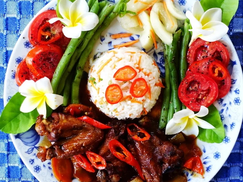 Bräunierte Chicken-Wings in Kokosnuss-Sauce - Rendang sayap ayam - Rezept - Bild Nr. 14393