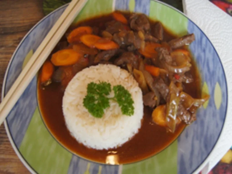 Rezept: Rindfleisch mit Möhren-Zwiebel-Gemüse im Wok und Basmatireis Bild Nr. 2 Rindfleisch mit Möhren-Zwiebel-Gemüse im Wok und Basmatireis - Rezept - Bild Nr. 2