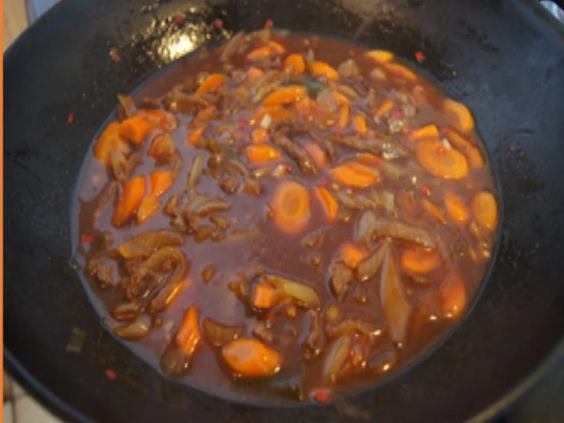 Rezept: Rindfleisch mit Möhren-Zwiebel-Gemüse im Wok und Basmatireis Bild Nr. 15 Rindfleisch mit Möhren-Zwiebel-Gemüse im Wok und Basmatireis - Rezept - Bild Nr. 15