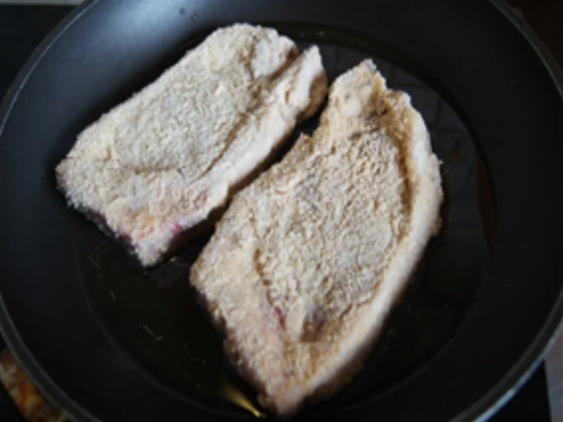 Rezept: Paniertes Kalbskotelett mit Kenia Bohnen und Rosmarindrillingen Bild Nr. 5 Paniertes Kalbskotelett mit Kenia Bohnen und Rosmarindrillingen - Rezept - Bild Nr. 5