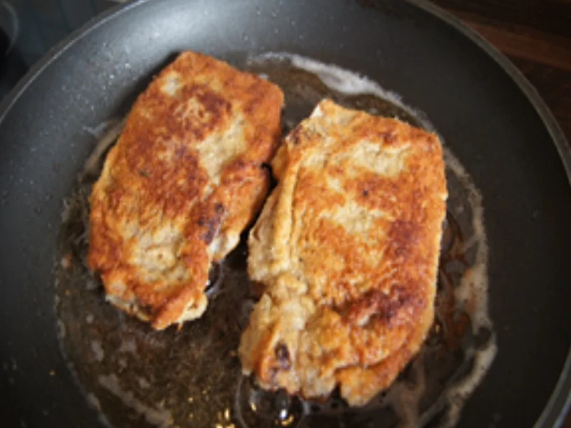 Rezept: Paniertes Kalbskotelett mit Kenia Bohnen und Rosmarindrillingen Bild Nr. 6 Paniertes Kalbskotelett mit Kenia Bohnen und Rosmarindrillingen - Rezept - Bild Nr. 6