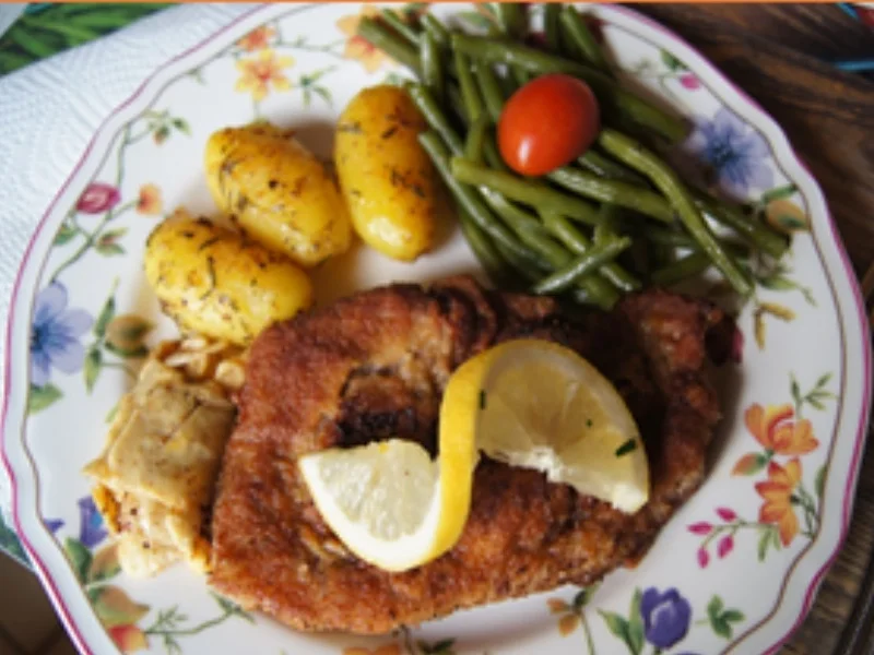 Rezept: Paniertes Kalbskotelett mit Kenia Bohnen und Rosmarindrillingen Bild Nr. 12 Paniertes Kalbskotelett mit Kenia Bohnen und Rosmarindrillingen - Rezept - Bild Nr. 12