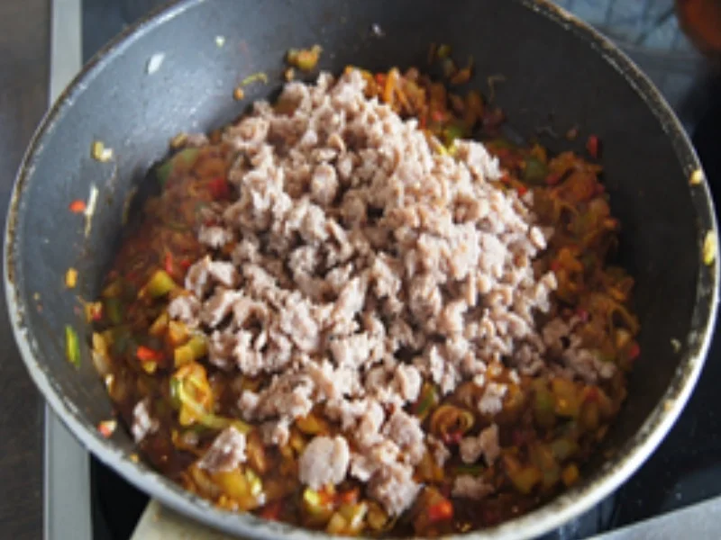 Rezept: Pikant gefüllte und gebackene Paprika Bild Nr. 11 Pikant gefüllte und gebackene Paprika - Rezept - Bild Nr. 11