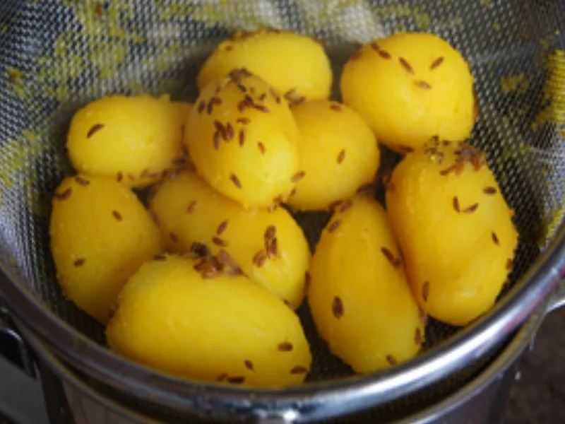 Rezept: Gebratenes Alaska-Seelachsfilet mit Zucchini und Kümmel-Drillingen Bild Nr. 11 Gebratenes Alaska-Seelachsfilet mit Zucchini und Kümmel-Drillingen - Rezept - Bild Nr. 11