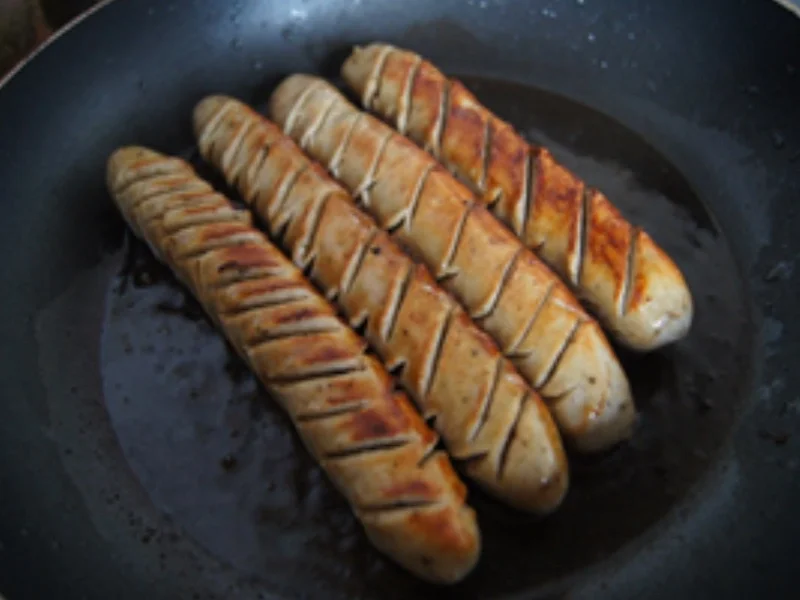 Rezept: Currybratwürste mit Tzatziki Bild Nr. 4 Currybratwürste mit Tzatziki - Rezept - Bild Nr. 4