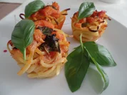 Rezept: Spaghetti-Nester mit Tomaten-Hollandaise Bild Nr. 14700 Spaghetti-Nester mit Tomaten-Hollandaise - Rezept - Bild Nr. 14700