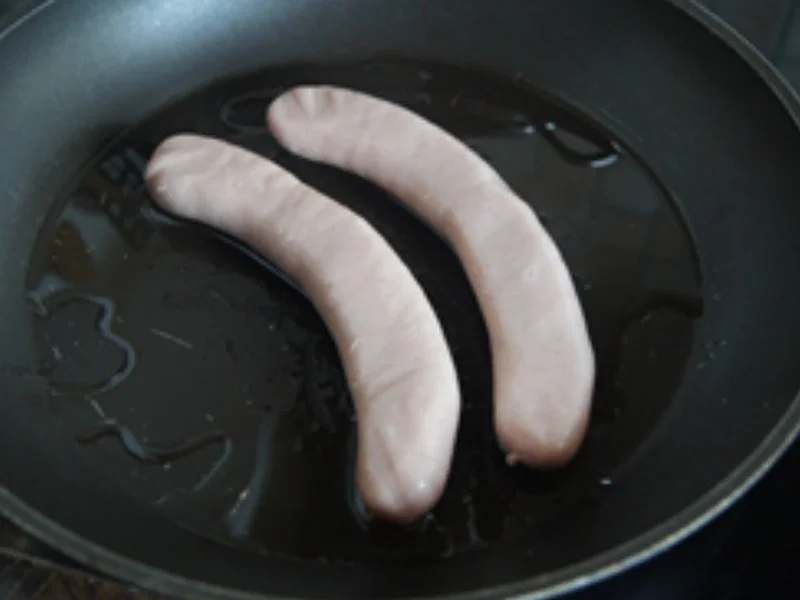 Feine Bratwurst mit Buschbohnen und Kartoffelstampf mit Röstzwiebeln - Rezept - Bild Nr. 4