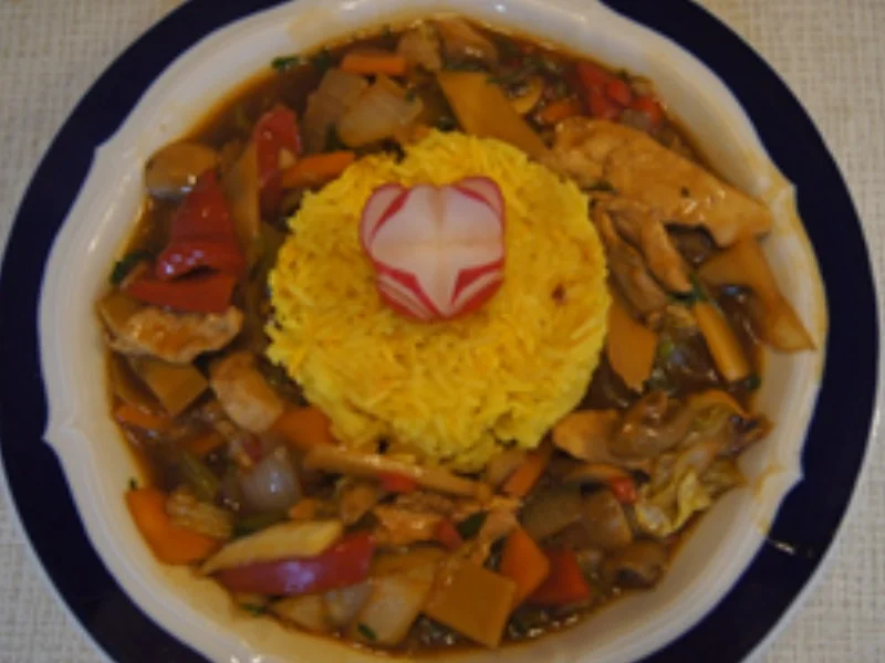 Gebratenes Hähnchenbrustfilet mit bunten Gemüse und Basmatireis - Rezept - Bild Nr. 15156