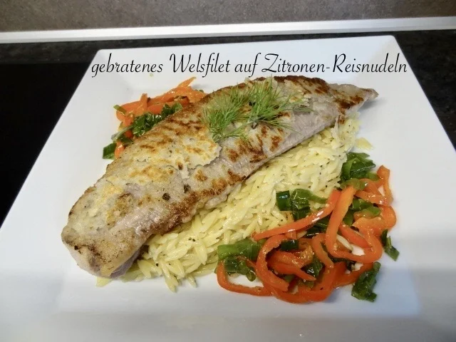 Rezept: gebratenes Welsfilet auf Zitronen - Nudelreis mit kleiner Gemüsebeilage Bild Nr. 2 gebratenes Welsfilet auf Zitronen - Nudelreis mit kleiner Gemüsebeilage - Rezept - Bild Nr. 2