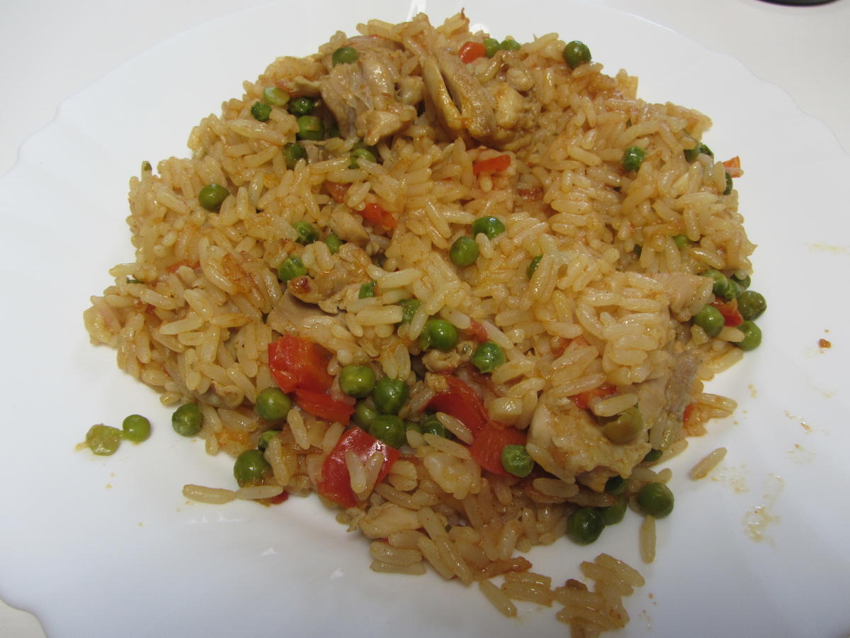 Arroz con Pollo - Reis mit Hühnchenfleisch einfach zuzubereiten - Rezept - Bild Nr. 2