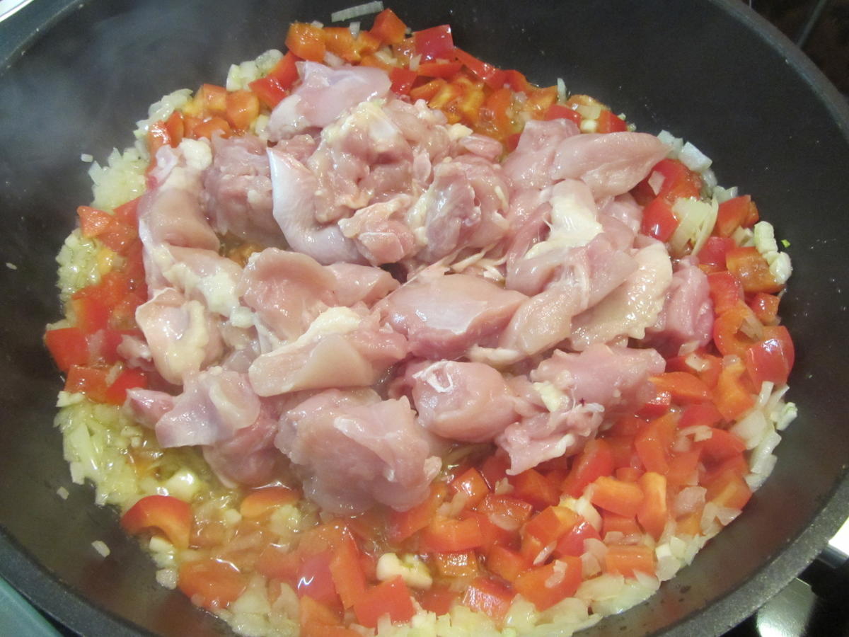 Arroz con Pollo - Reis mit Hühnchenfleisch einfach zuzubereiten - Rezept - Bild Nr. 15382