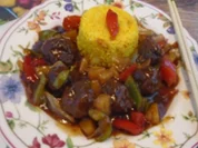 Schweinefleischbällchen mit Wok-Gemüse und gelben Basmatireis - Rezept - Bild Nr. 2