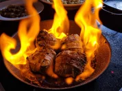 Flambierte Kalbsmedaillons im Speckmantel - Rezept - Bild Nr. 15567