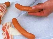 Rezept: Käsewürstchen im Speckmantel Käsewürstchen im Speckmantel - Rezept