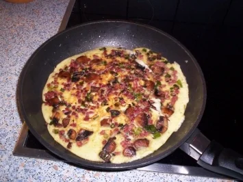 Rezept: Herzhafte Pfannkuchen mit braunen Champingnons und Lauchzwiebeln Herzhafte Pfannkuchen mit braunen Champingnons und Lauchzwiebeln - Rezept