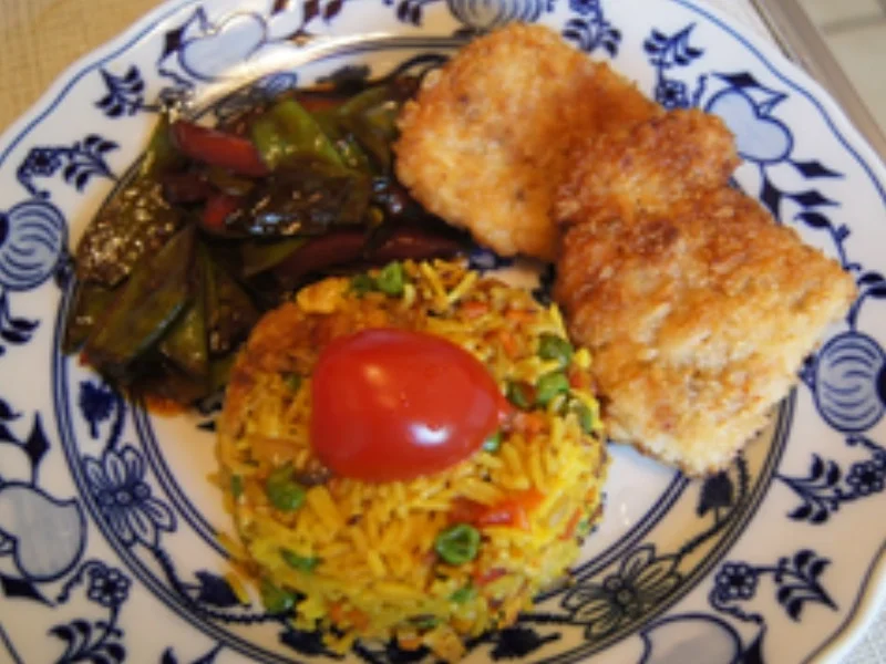 Krosse Putenschnitzel mit Paprika-Zuckerschoten-Wok-Gemüse und bunten Bratreis - Rezept - Bild Nr. 14