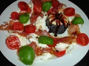 Rezept: Frische Feige mit Mozarella und Serranoschinken Frische Feige mit Mozarella und Serranoschinken - Rezept