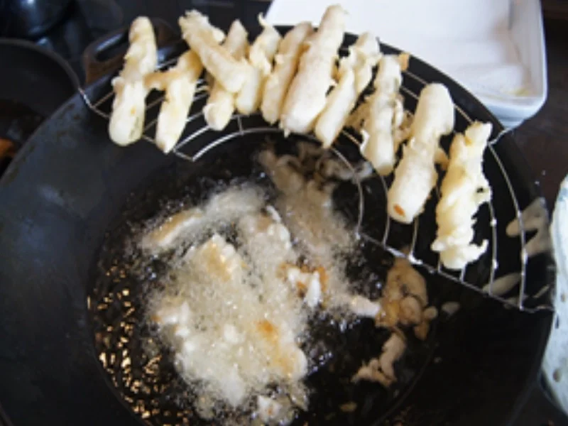 Schnitzeltasche griechischer Art mit frittierten Spargel und Kümmel-Drillingen - Rezept - Bild Nr. 15