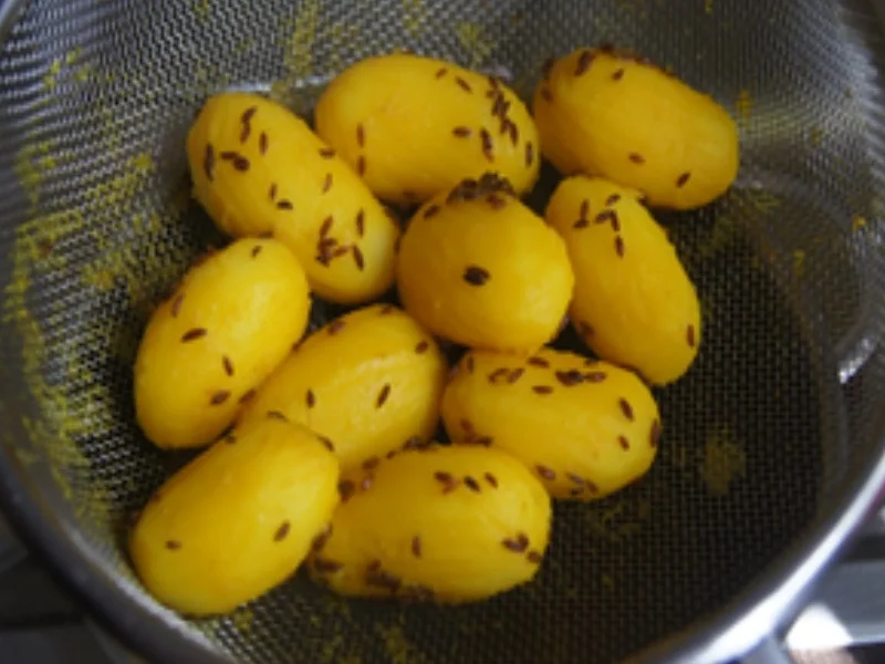 Schnitzeltasche griechischer Art mit frittierten Spargel und Kümmel-Drillingen - Rezept - Bild Nr. 14