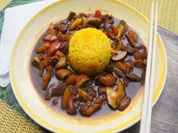 Putenschnitzel, Paprikamix und Champignons im Wok mit gelben Basmatireis - Rezept - Bild Nr. 2