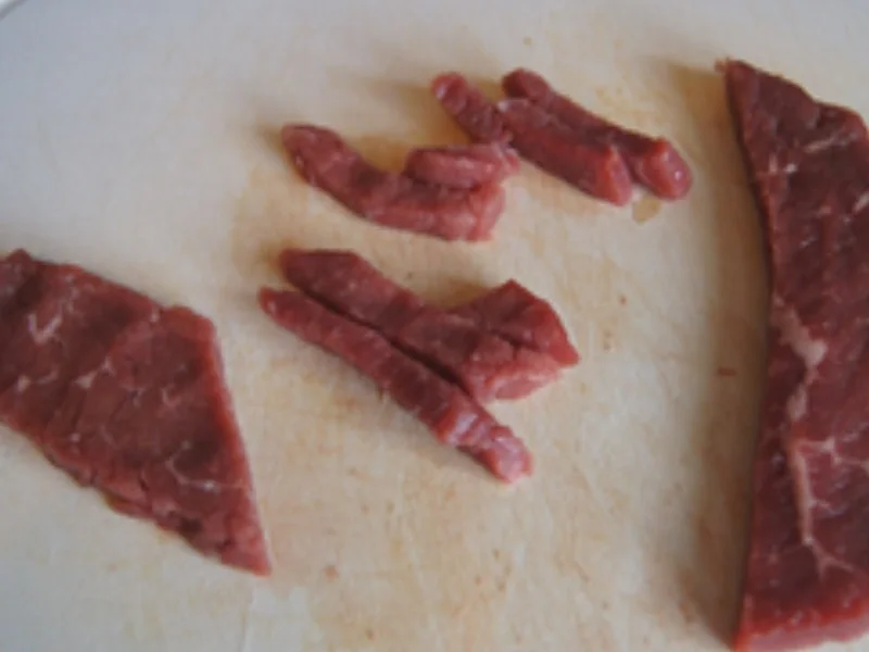 Rindfleisch mit Brokkoli im Wok und gelber Basmatireis - Rezept - Bild Nr. 16000