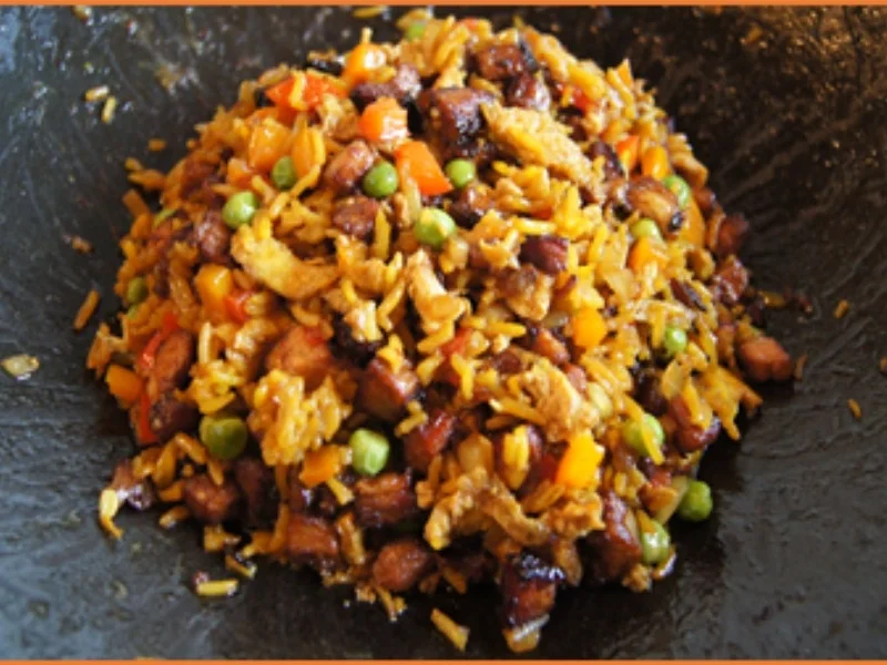 Rezept: Schweinebauch-Eier-Gemüse-Bratreis Bild Nr. 2 Schweinebauch-Eier-Gemüse-Bratreis - Rezept - Bild Nr. 2