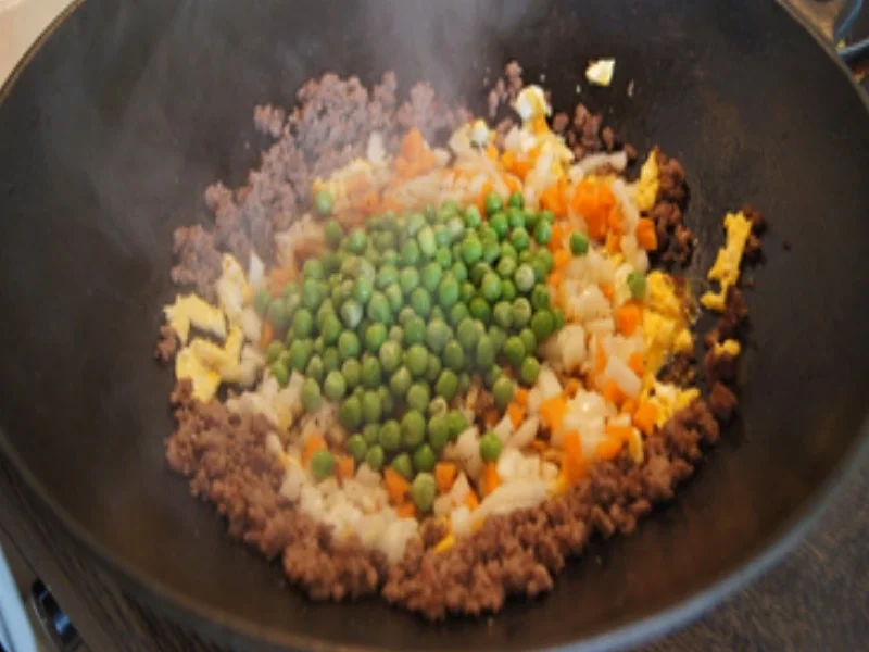 Rezept: Asiatischer Bratreis mit Garnelenspieße Bild Nr. 9 Asiatischer Bratreis mit Garnelenspieße - Rezept - Bild Nr. 9