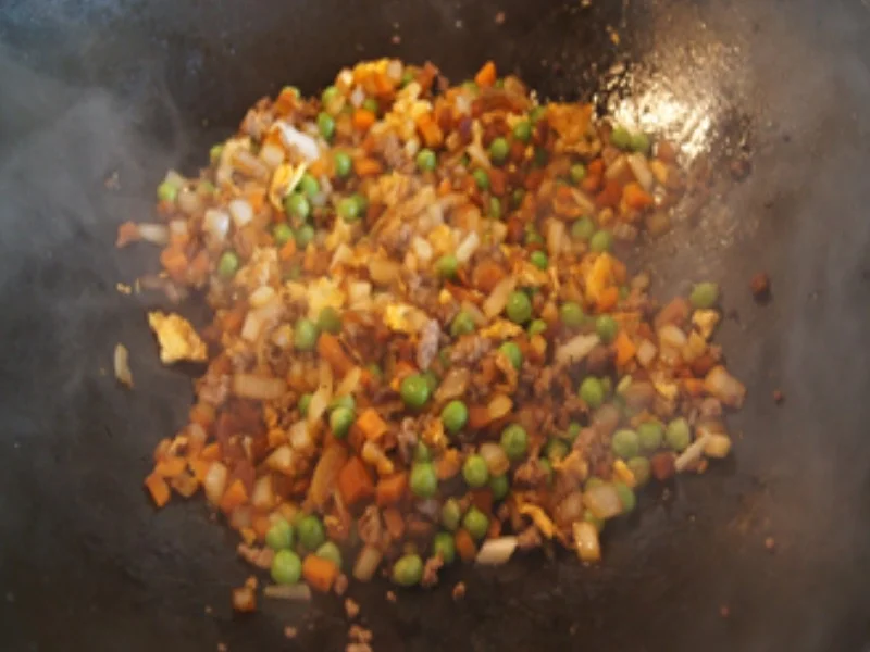 Rezept: Asiatischer Bratreis mit Garnelenspieße Bild Nr. 10 Asiatischer Bratreis mit Garnelenspieße - Rezept - Bild Nr. 10