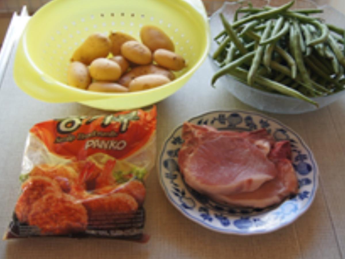 Stielkotelett in Knusperpanade mit Buschbohnen und Kartoffelstampf - Rezept - Bild Nr. 3