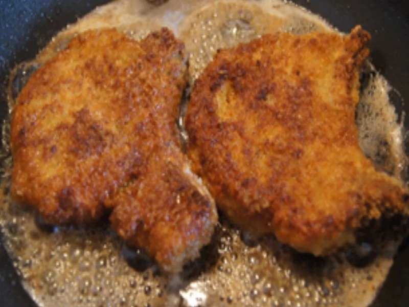 Stielkotelett in Knusperpanade mit Buschbohnen und Kartoffelstampf - Rezept - Bild Nr. 6