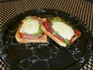 Rezept: Blitz Mini-Pizzas mit Rucola und Mozzarella Blitz Mini-Pizzas mit Rucola und Mozzarella - Rezept