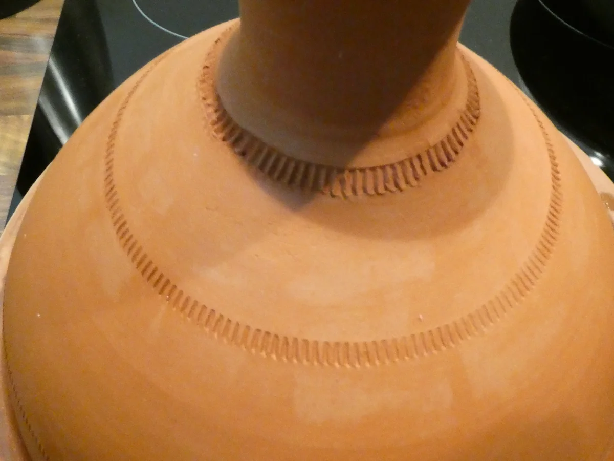 Hähnchen Tajine mit Salzzitrone und Oliven auf Couscous - Rezept - Bild Nr. 16258