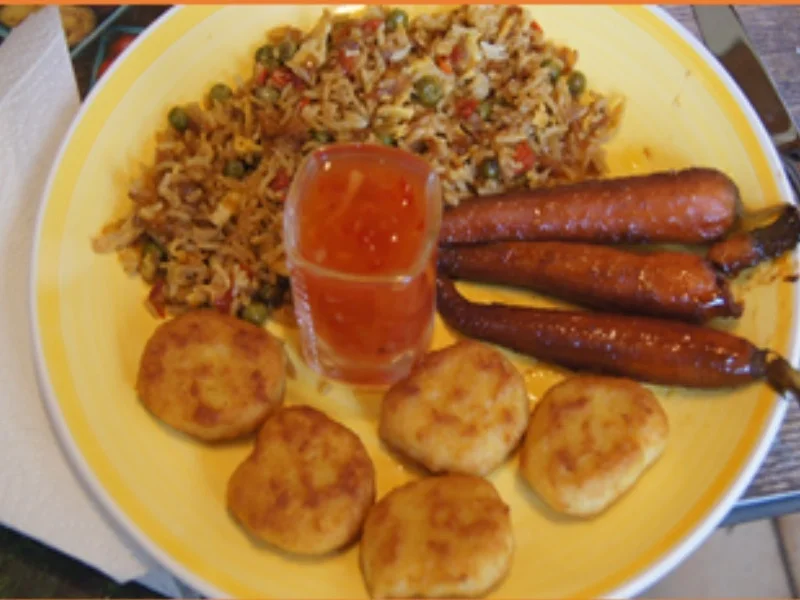 Rezept: Chicken Nuggets mit Honig-Bundmöhren und bunten Reis Bild Nr. 16247 Chicken Nuggets mit Honig-Bundmöhren und bunten Reis - Rezept - Bild Nr. 16247