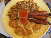 Chicken Nuggets mit Honig-Bundmöhren und bunten Reis - Rezept - Bild Nr. 16247