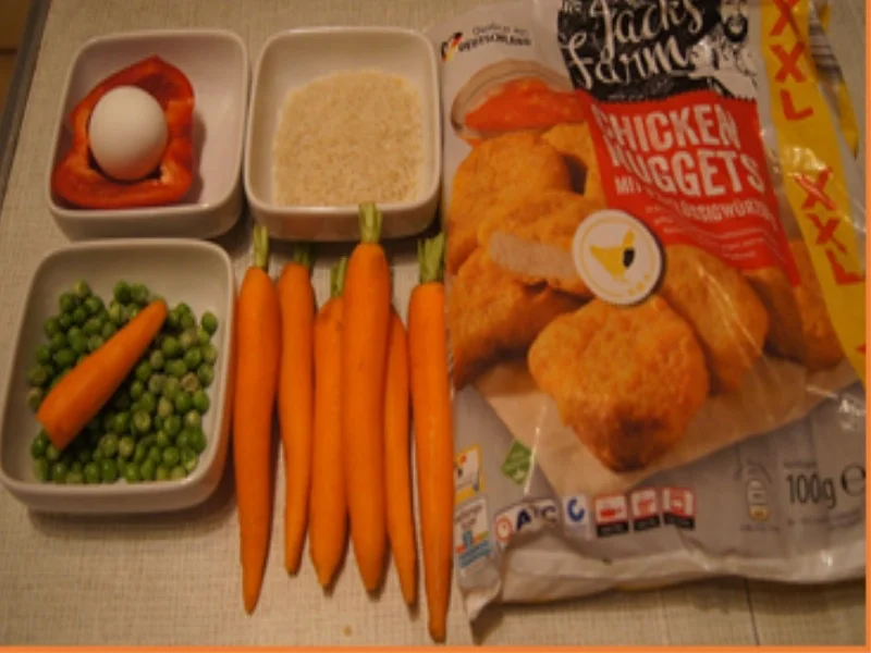 Rezept: Chicken Nuggets mit Honig-Bundmöhren und bunten Reis Bild Nr. 16248 Chicken Nuggets mit Honig-Bundmöhren und bunten Reis - Rezept - Bild Nr. 16248